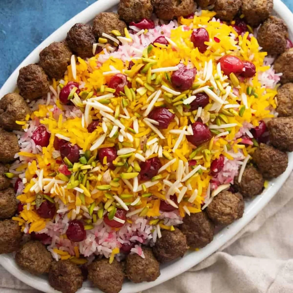 آلبالوپلو مجلسی با فیله گوسفندی